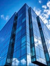 Elegant Glass Skyscraper, Captivating Architecture and a Brilliant Blue Sky