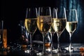 Elegant glasses champagne or Prosecco sparkling wine, dark background, golden bokeh. Holiday concept, New Year, party Royalty Free Stock Photo