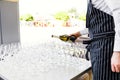 Elegant glasses with champagne standing in a row on serving tabl Royalty Free Stock Photo