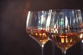 Elegant glasses with white wine on background, closeup Royalty Free Stock Photo