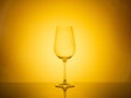 Elegant glassware display illuminated by captivating colored lighting, ideal for creative concepts Royalty Free Stock Photo