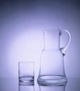 Elegant glassware glowing in the backlight with stunning helium filters Royalty Free Stock Photo