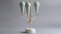 Elegant gold and ceramic ice cream cone stand with mint green cones Royalty Free Stock Photo