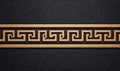 Elegant gold Meander pattern border with a classic Greek Key design on dark background. Royalty Free Stock Photo