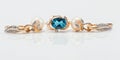 Elegant gold ring with Topaz and gold earrings with natural pear