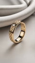 Elegant gold wedding ring with intricate Celtic pattern and diamond accentgold ring Royalty Free Stock Photo