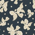 Elegant golden paisley ethnic seamless vector pattern on dark gray dotted background for fabric, wallpaper, scrapbooking