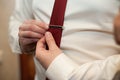 Elegant gorgeous groom getting ready in the morning in the hotel Royalty Free Stock Photo