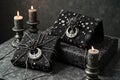 Elegant gothic gift wrapping with intricate decorations and candlelit ambiance Royalty Free Stock Photo