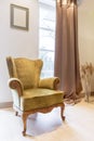 Elegant green armchair in classic style