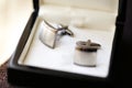 Elegant groom`s cuff links in a box Royalty Free Stock Photo
