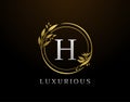 Elegant H Letter Floral Design. Circle Luxury H Gold Logo Icon Royalty Free Stock Photo