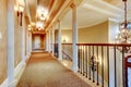 Elegant hallway with black railing. Royalty Free Stock Photo