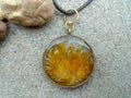 elegant handmade resin jewelry, pressed flowers of dandelion in epoxy resin