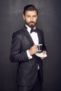 Elegant handsome man drinking coffee