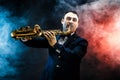Handsome adult man playing saxophone Royalty Free Stock Photo