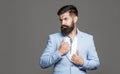 Elegant handsome man in suit. Handsome bearded businessman in classic suits. Man in suit. Male beard and mustache Royalty Free Stock Photo