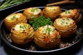 Elegant hasselback potatoes on a pan Royalty Free Stock Photo