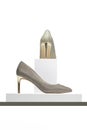 Elegant high heeled silver ladies shoes on display
