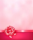 Elegant holiday background with gift pink bow