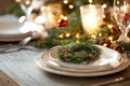 Elegant holiday dining table with festive candlelight and greenery decorations Royalty Free Stock Photo