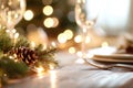 Elegant holiday dining table with festive candlelight and greenery decorations Royalty Free Stock Photo