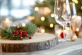 Elegant holiday dining table with festive candlelight and greenery decorations Royalty Free Stock Photo