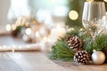 Elegant holiday dining table with festive candlelight and greenery decorations Royalty Free Stock Photo