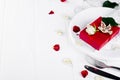 Elegant holiday table setting with red ribbon gift Royalty Free Stock Photo