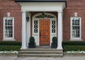 Elegant entrance with wood grain door