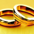 Shimmering Gold Wedding Rings - A Symbol of Eternal Love Royalty Free Stock Photo