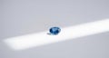 Single Blue Sapphire on White Royalty Free Stock Photo
