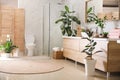 Elegant interior of bathroom with green plants Royalty Free Stock Photo