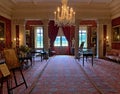 Elegant interior at Stourhead House in Wiltshire with a view of the spacious grounds outside