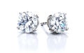 Elegant Isolated Diamond Stud Earrings on White -Generative Ai