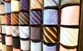 Elegant italian neckties in a tie rack Royalty Free Stock Photo