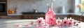 Elegant kitchen scene with cherry blossom decor and pink infused water Royalty Free Stock Photo