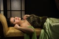 Elegant lady in a luxurious boudoir Royalty Free Stock Photo