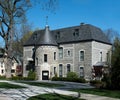 Elegant Gray Stone Mansion with Round Turret Royalty Free Stock Photo