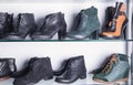 Elegant leather female boots in the store Royalty Free Stock Photo