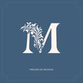 Elegant letter M. Graceful royal style. Calligraphic beautiful logo. Vintage drawn emblem for book design, brand name, business ca