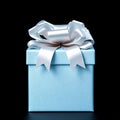 Elegant light blue gift box with a silver ribbon bow Royalty Free Stock Photo