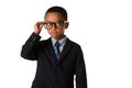Elegant little boy with glasses in business suit. Concept of leadership and success. Isolated Royalty Free Stock Photo