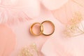 Elegant Love background - two golden rings and decorations Royalty Free Stock Photo