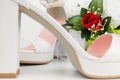 Elegant Luxury Laced Bridal Wedding Shoes And Bouquet With Red R Royalty Free Stock Photo