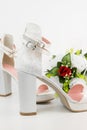 Elegant Luxury Laced Bridal Wedding Shoes And Bouquet With Red R Royalty Free Stock Photo