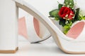 Elegant Luxury Laced Bridal Wedding Shoes And Bouquet With Red R Royalty Free Stock Photo