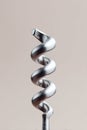 Elegant macro shot of a metal corkscrew. Could represent precision, extraction, solution, or a twist in a situation. Perfect for Royalty Free Stock Photo