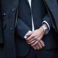 Elegant man in suit and coat closeup outdoor shot