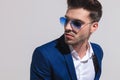 Elegant man in sunglasses looking away to side Royalty Free Stock Photo